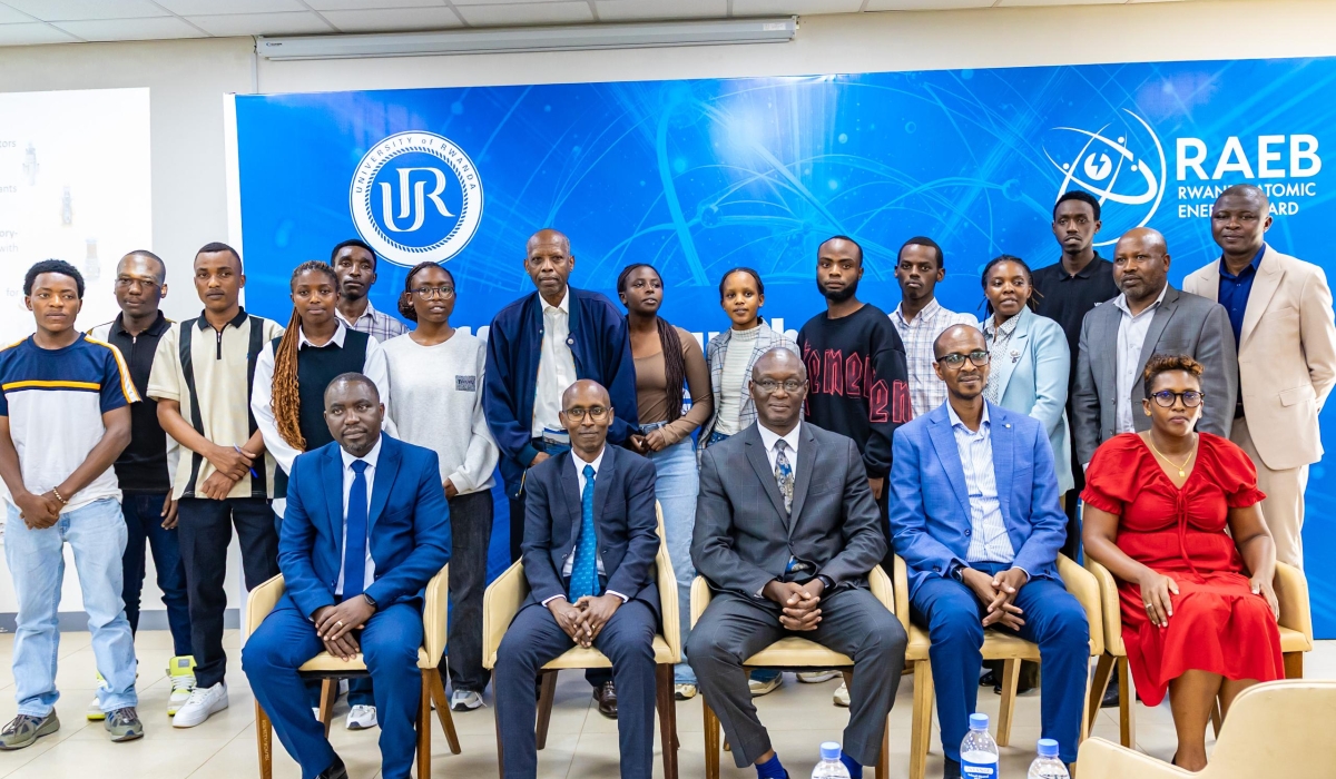 Rwanda Atomic Energy Board (RAEB) officials, UR representatives, and students pose for a photo during the official launch of a Bachelor of Science program in Nuclear Science and Technology on Wednesday, December  3.