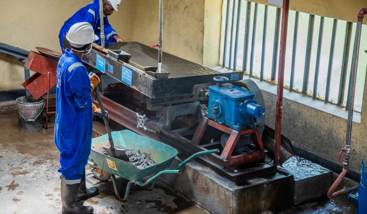 Workers operate mineral testing equipment at a mining facility, preparing samples and monitoring analysis results on December 4. Photo by Craish Bahizi