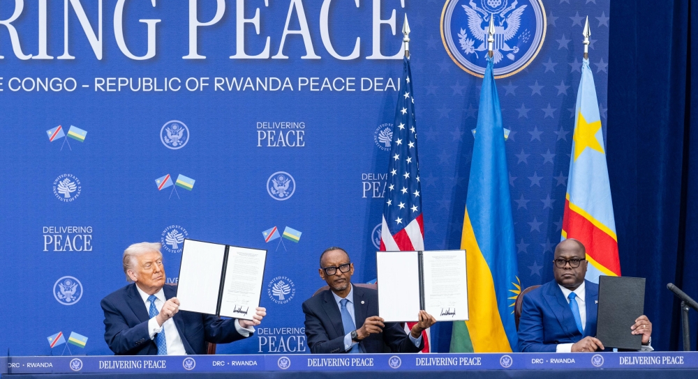 President Kagame signs a peace agreement alongside US President Donald Trump and Congolese President Félix Tshisekedi in the United States on December 4. PHOTO BY VILLAGE URUGWIRO