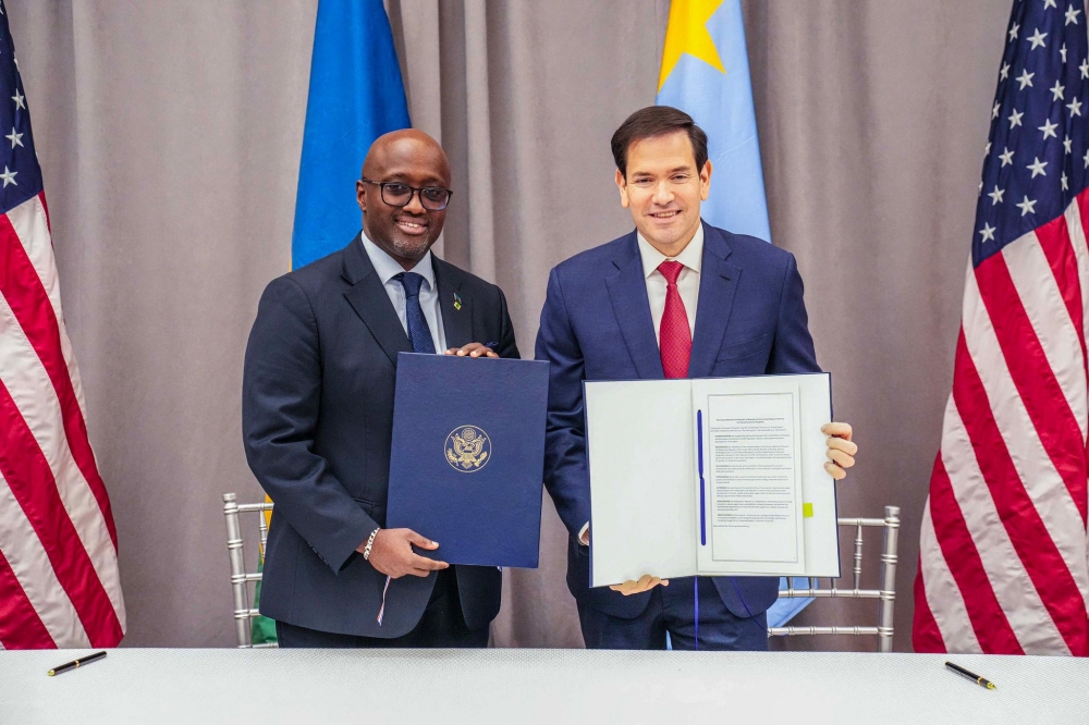 Foreign affairs minister Olivier Nduhungirehe and US Secretary of State Marco Rubio pose for a photo after signing a bilateral economic agreement between Rwanda and the US. 
