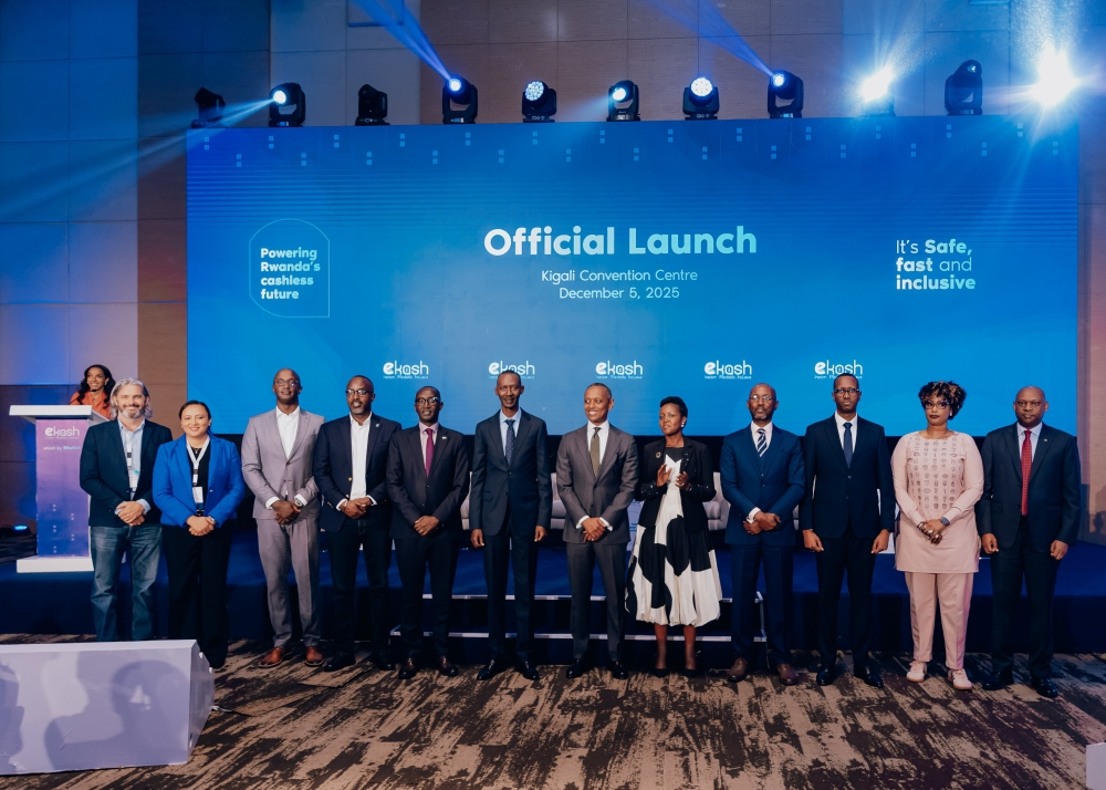 Government officials gather for a group photo during the launch of eKash in Kigali on Friday, December 5. Photos by Craish Bahizi