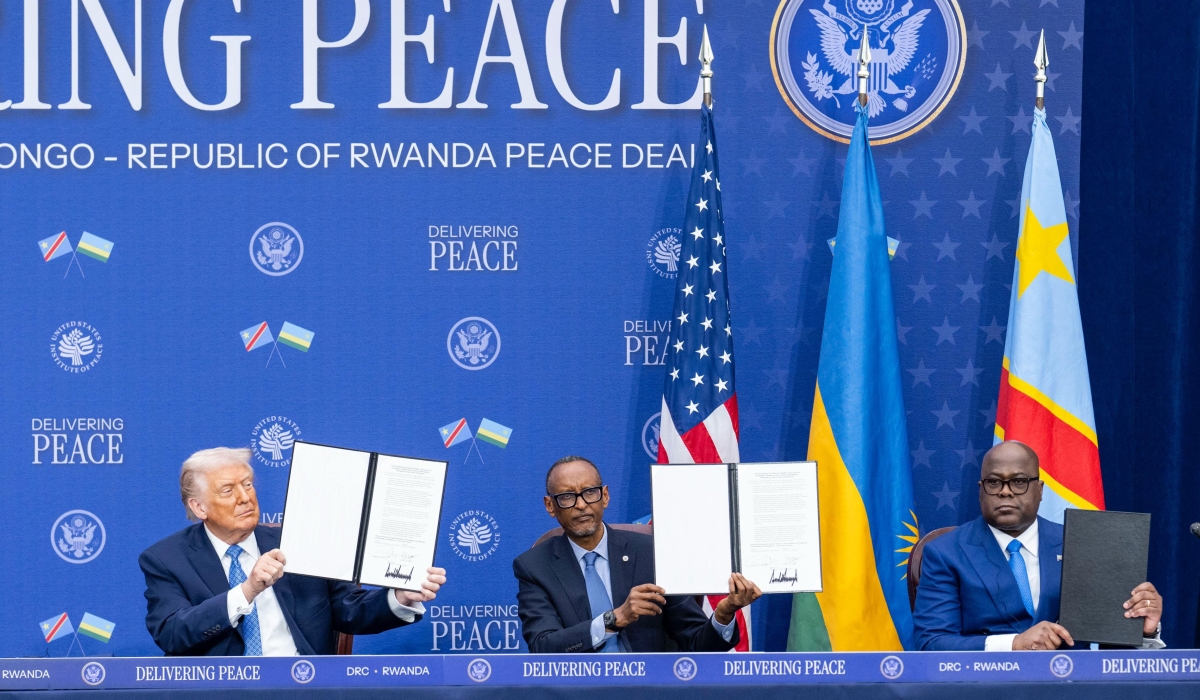 President Kagame signs a peace agreement alongside US President Donald Trump and Congolese President Félix Tshisekedi in the United States on December 4. PHOTO BY VILLAGE URUGWIRO