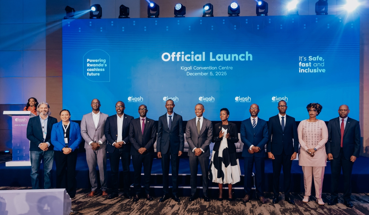 Government officials gather for a group photo during the launch of eKash in Kigali on Friday, December 5. Photos by Craish Bahizi