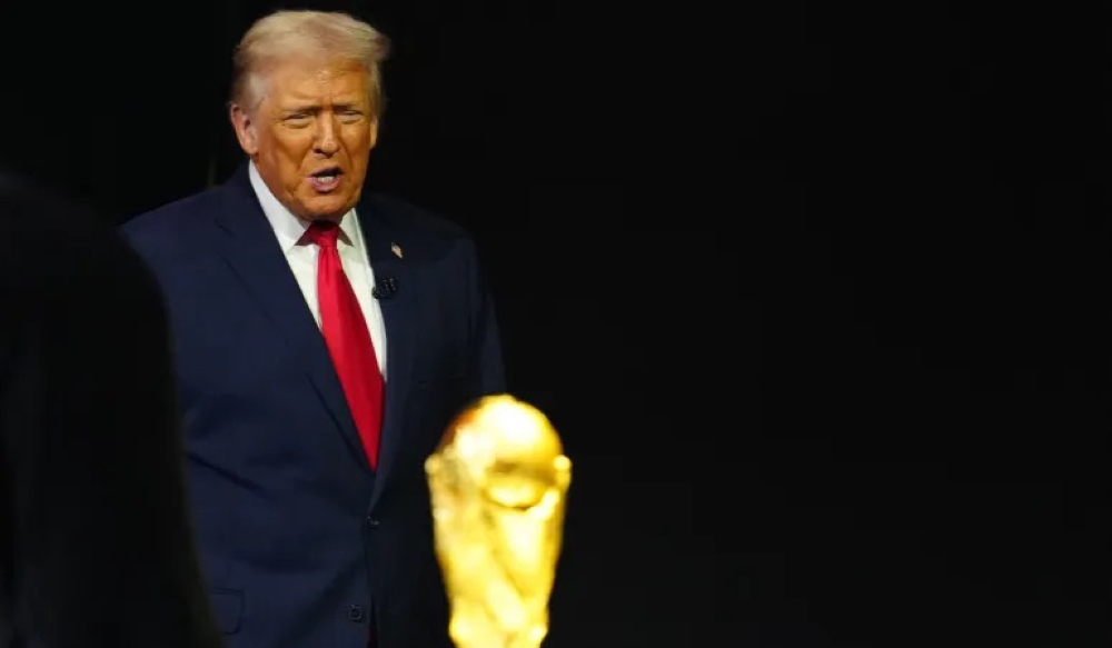 US President Donald Trump was in attendence at the FIFA World Cup 2026 draw and received a peace prize [Jia Haocheng/Reuters]
