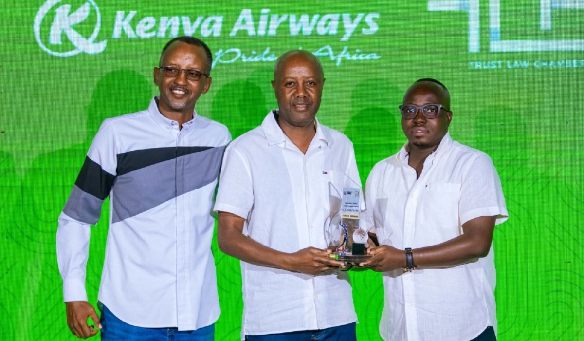 Sezibera (c) receives the PMC Gold League 2025 title from Sensitive Group CEO Wilson Mugwema (R). They were joined by Kigali Golf Club president  Marcel Byusa (L). Photo courtesy