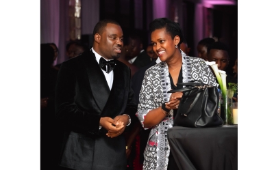 Minister of State for Youth and Arts Sandrine Umutoni (R) shares a light moment with Zacu TV CEO Wilson Misago at a gala held December 5. Photo courtesy