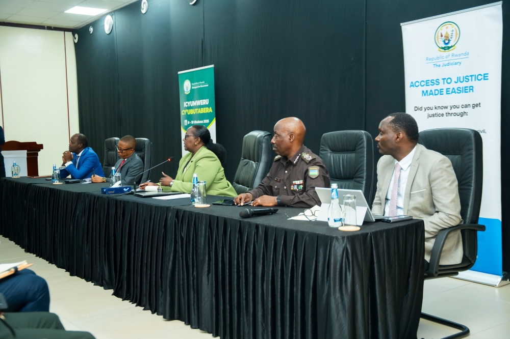 Chief Justice Domitilla Mukantaganzwa (C) addresses the media during the launch of Justice Week in Kigali on Monday, December 8. Courtesy.