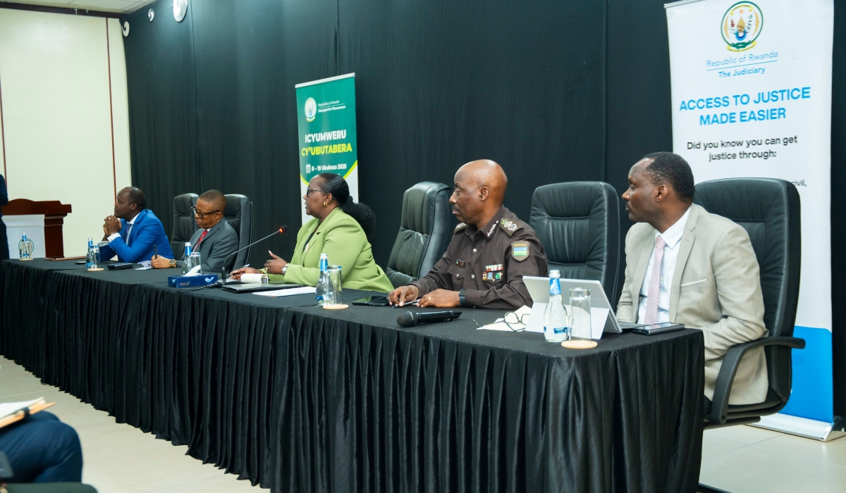Chief Justice Domitilla Mukantaganzwa (C) addresses the media during the launch of Justice Week in Kigali on Monday, December 8. Courtesy.