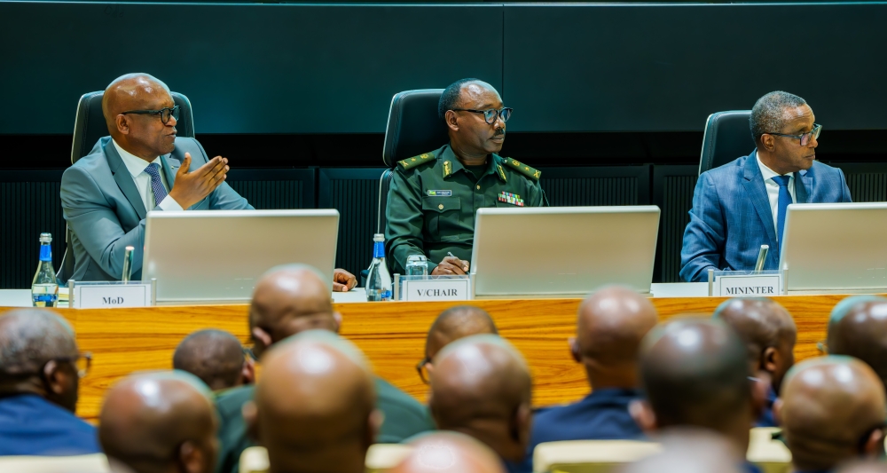 Defence minister Juvenal Marizamunda addresses the ZIGAMA Credit and Savings Society General Assembly on Friday, December 12, accompanied by Brig Gen Cooper Mike Mujuni, the Vice Chairperson of the cooperative’s Board of Directors, and interior minister Vincent Biruta.