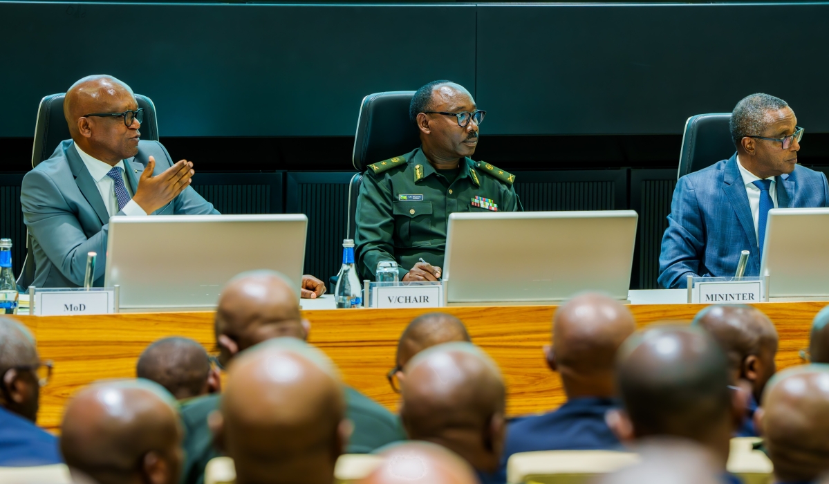 Defence minister Juvenal Marizamunda addresses the ZIGAMA Credit and Savings Society General Assembly on Friday, December 12, accompanied by Brig Gen Cooper Mike Mujuni, the Vice Chairperson of the cooperative’s Board of Directors, and interior minister Vincent Biruta.