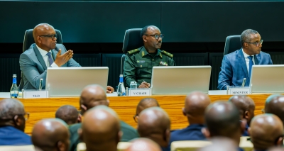 Defence minister Juvenal Marizamunda addresses the ZIGAMA Credit and Savings Society General Assembly on Friday, December 12, accompanied by Brig Gen Cooper Mike Mujuni, the Vice Chairperson of the cooperative’s Board of Directors, and interior minister Vincent Biruta.