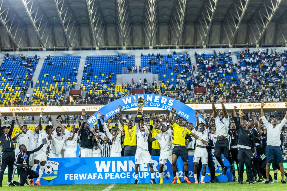 APR FC players and staff celebrate the Peace Cup victory on May 4, 2025. Photo by Olivier Mugwiza