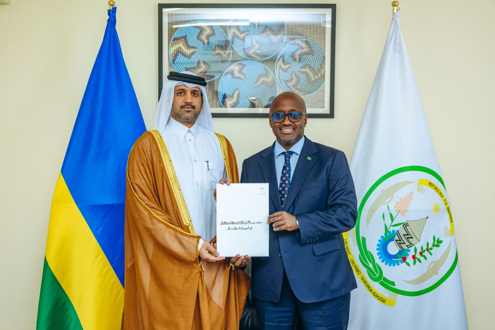 Mansour bin Ali Fahad Al-Shahwani Al-Hajri, the new Ambassador of the   State of Qatar to Rwanda, presents copie of his Letters of Credence to Olivier Jean-Patrick Nduhungirehe, Minister of Foreign Affairs