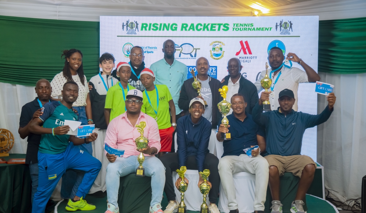 Winners of Rising Rackets Tennis Tournament pose for a group photo.