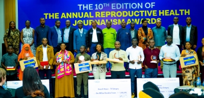 Officials and award winners pose for a group photo  at the 10th edition of the Annual Reproductive Health Journalism Awards, organised by the Health Development Initiative (HDI) on December 12. Photos by Hamza Ineza