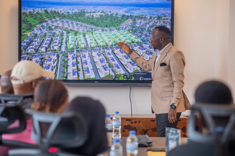 Rwandans from Diaspora follow a presentation on the urbanisation during their visit in Rwanda on Wednesday, December 17. Photos by Craish BAHIZI
