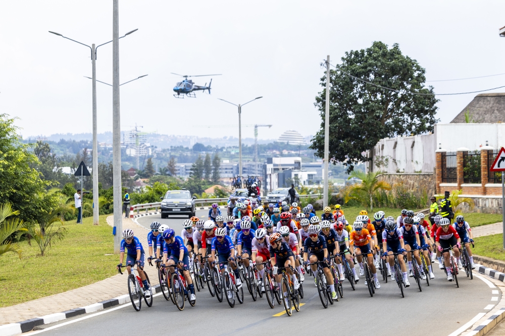 Cyclists ride in a peloton during the 2025 UCI World Road Championship in Kigali in September. OLIVIER MUGWIZA