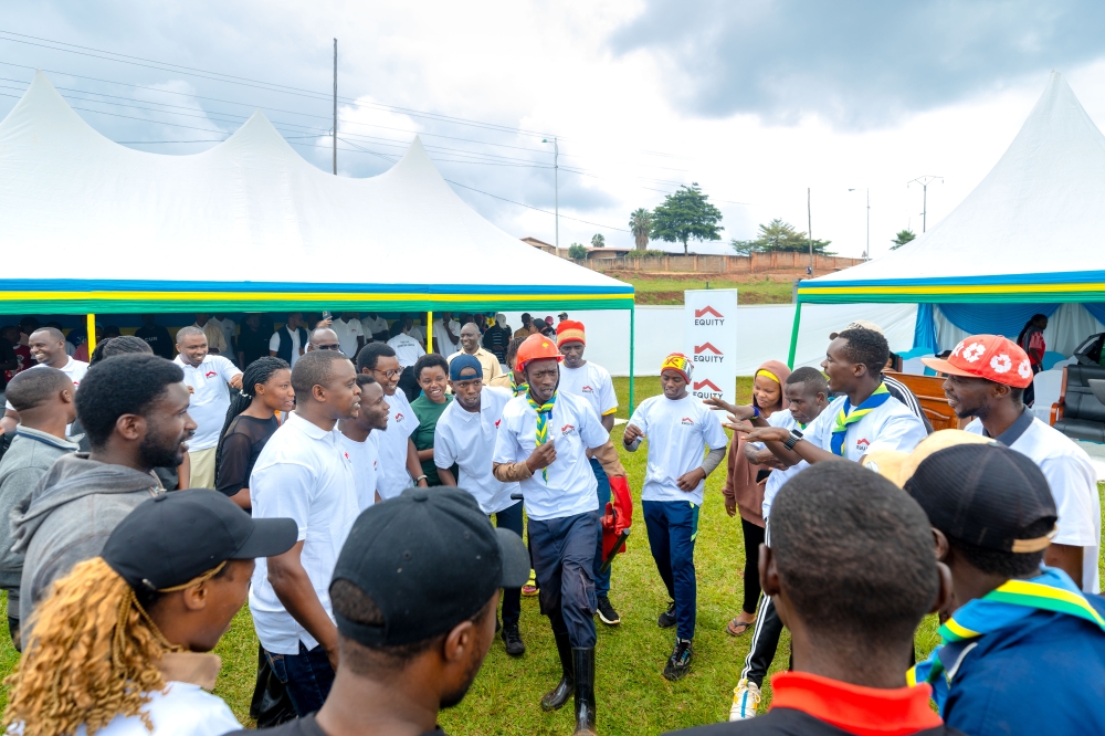 Equity Bank Rwanda  officials, together with community leaders, government officials, students, farmers and local residents, after planting trees.