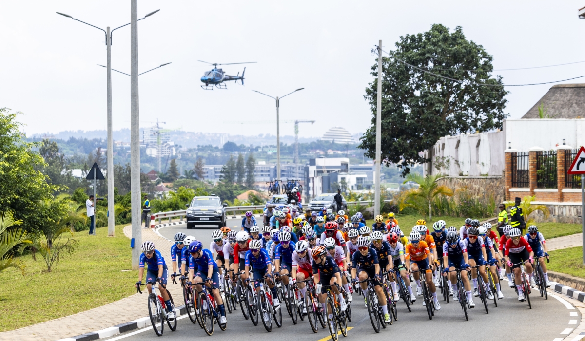 Cyclists ride in a peloton during the 2025 UCI World Road Championship in Kigali in September. OLIVIER MUGWIZA