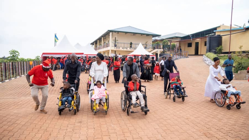Parents and their disabled children at Love with Actions Academy in Bumbogo Sector in Gasabo District