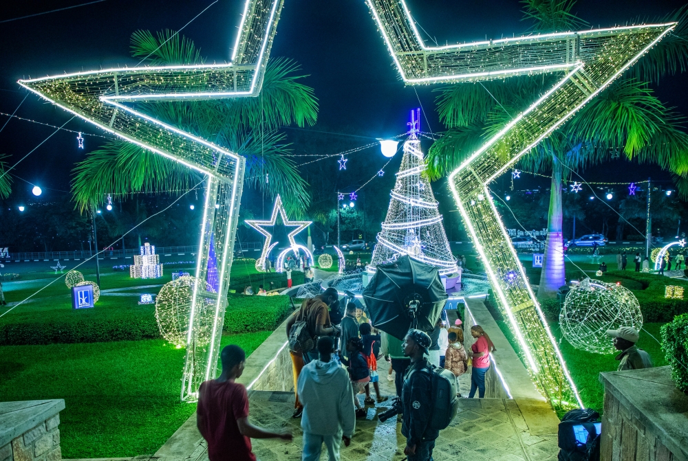 Kigali residents visit a decorated  Kigali main roundabout ahead of the festive season. Photos by Craish BAHIZI