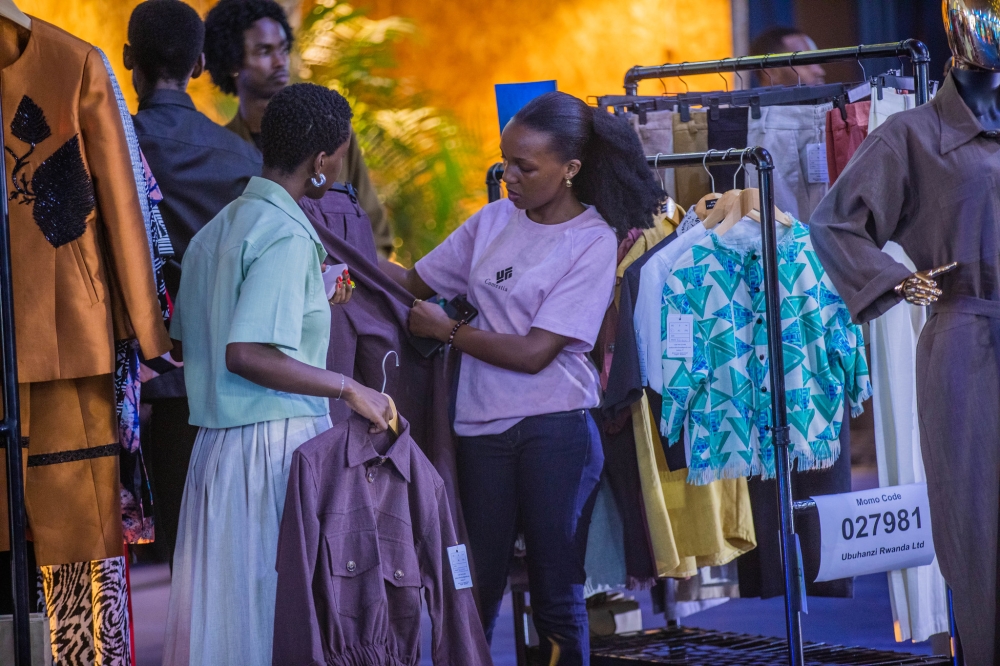 Delegates tour a mini exhibition at the venue.
