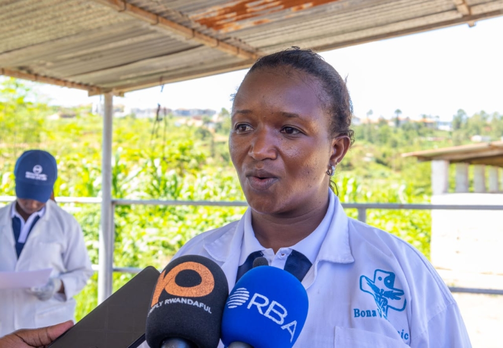 Deborah Umugwaneza, a veterinarian in Muhanga District, speaks to journalists.