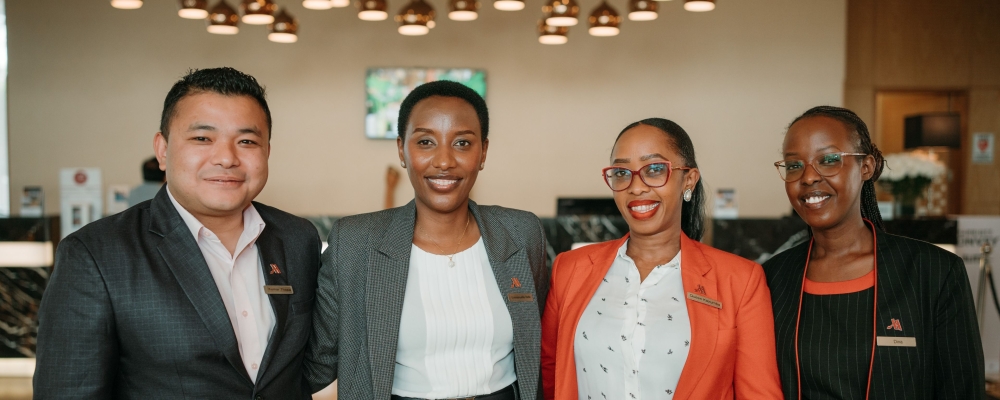 Emmanuela Belle Uwimbabazi (2nd Left) of Kigali Marriott Hotel has received the prestigious J. Willard Marriott Award of Excellence.