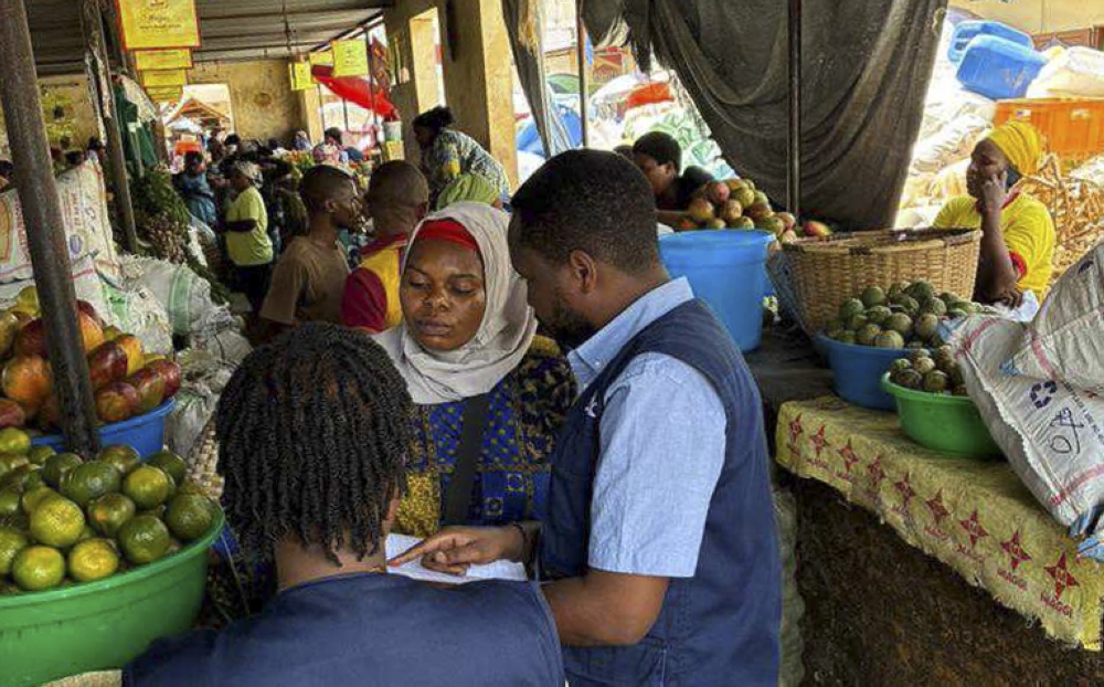 Inkomoko staff visit one of beneficiaries in Rubavu District.