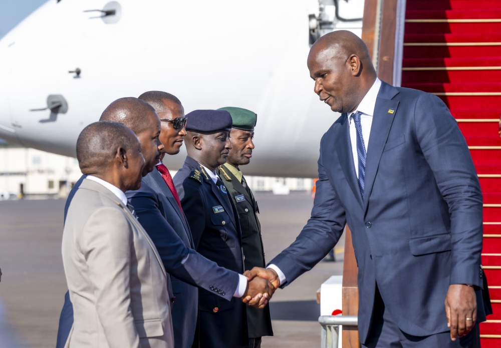 Rwandan officials welcome President of the Republic of Mozambique Daniel Chapo at Kigali International Airport.