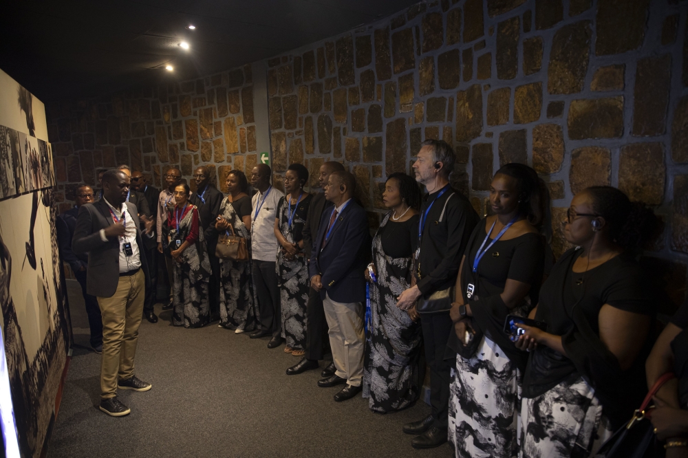 Staff during a guided tour of the memorial to learn more about Rwandan history.
