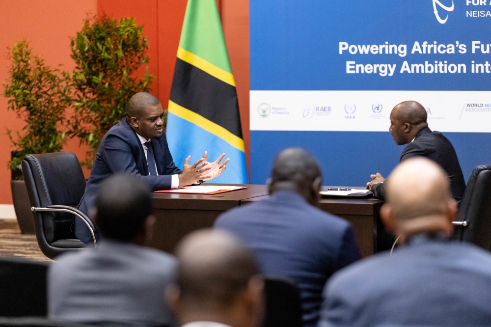 Rwanda&039;s Minister of Infrastructure Jimmy Gasore (right) and Tanzania’s Minister of Energy Deogratius John Ndejembi during the signing ceremony Kigali, Tuesday, May 19. Photo by Dan Gatsinzi