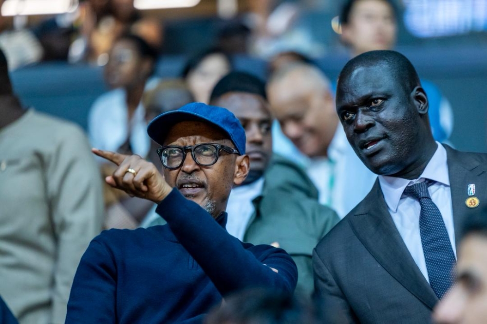 President Paul Kagame(L) and BAL President Amadou Gallo Fall watched BAL Playoff game between RSSB Tigers and FUS Rabat at BK Arena