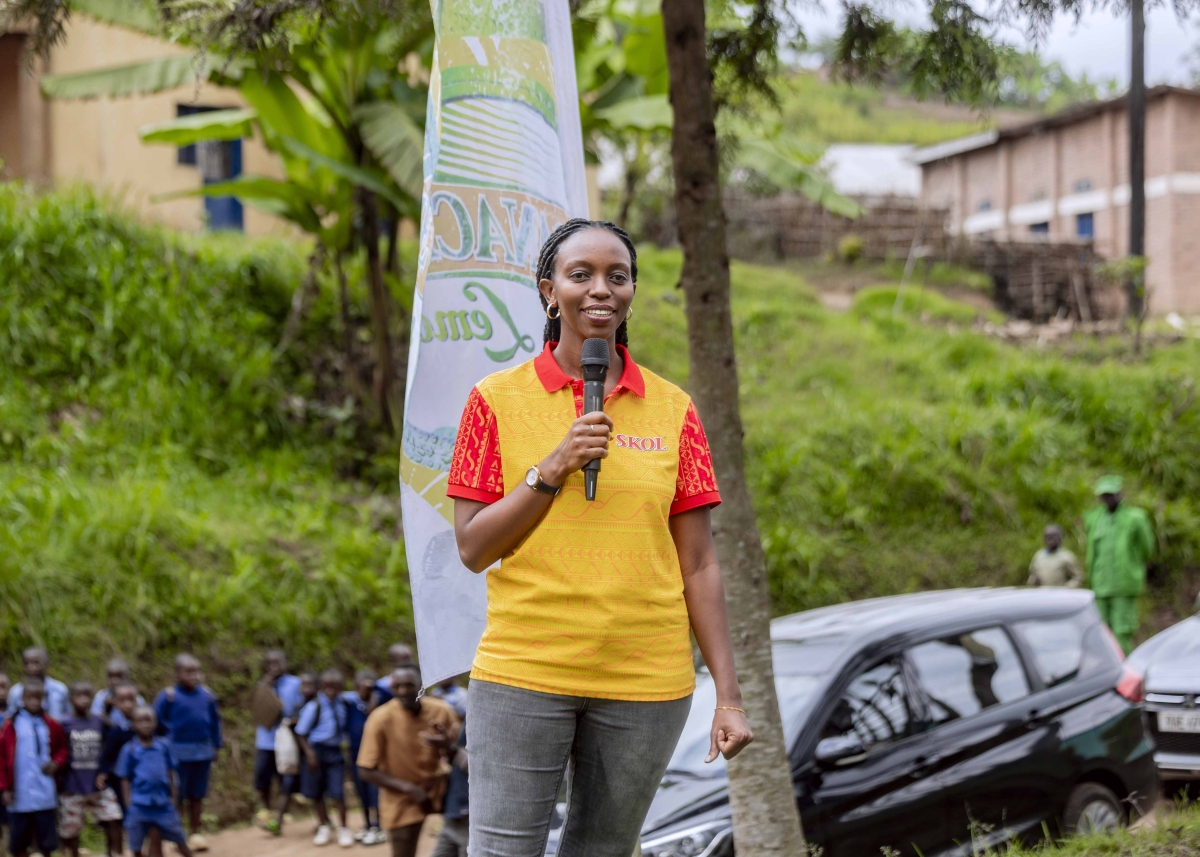 Head of Corporate Social Responsibility and Public Relations at SKOL Brewery Ltd, Emilienne Benurugo, speaks to the residents.