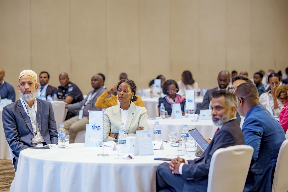 Delegates follow panelists in a discussion during VisiontechPLG Rwanda Launch Summit 2026, a high-level executive and policy forum