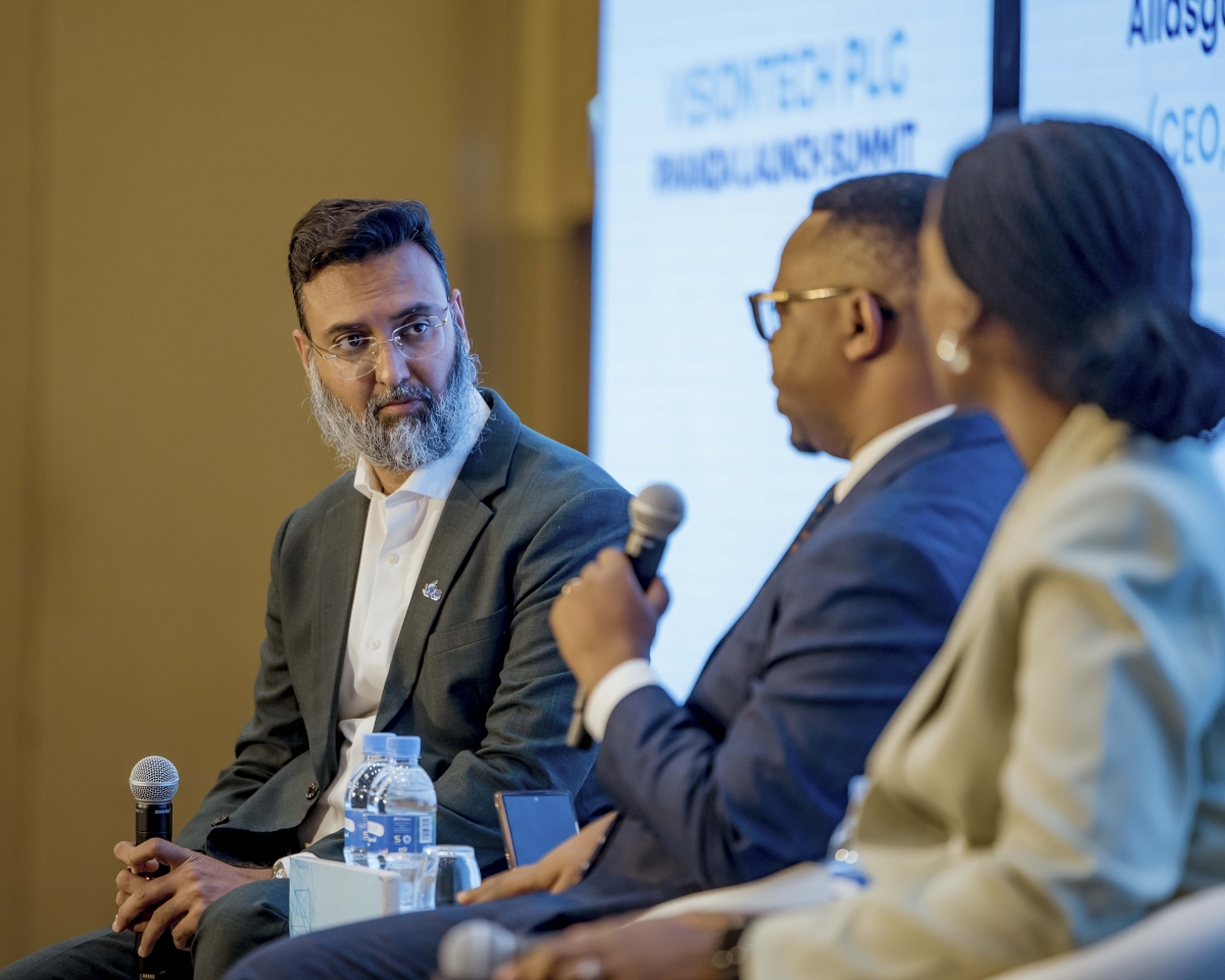 Panelists engage in a discussion.