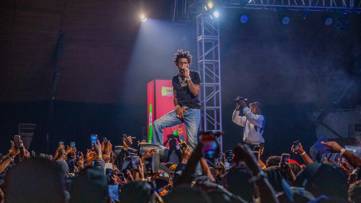 Music fans cheer on the artistes during the SKOL-sponsored Africast Fest A Shallipopi Xperience, held at the Kigali Conference and Exhibition Village (KCEV) on Friday, May 29. Photos by Craish BAHIZI