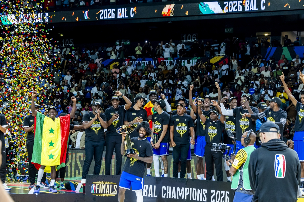 Players enjoy a historic title triumph with RSSB Tigers, who edged Petro de Luanda 90–88 in Sunday's final at BK Arena.