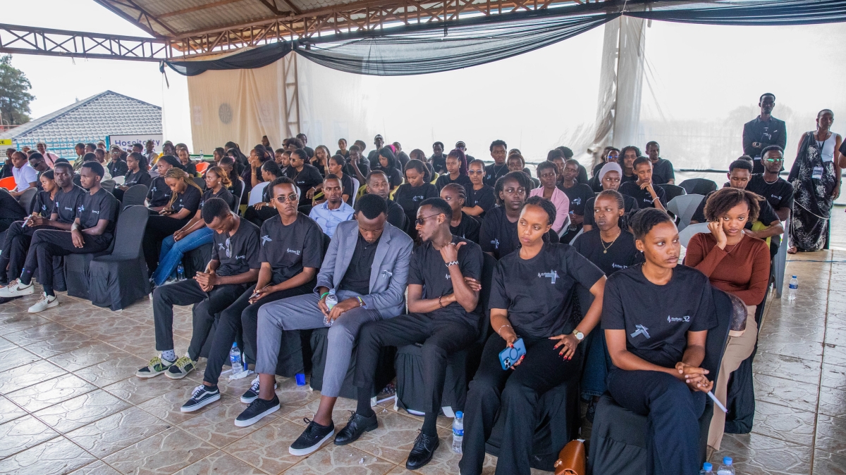 Mourners listen to Lt. Col. Simon Kabera duringh the commemoration event.