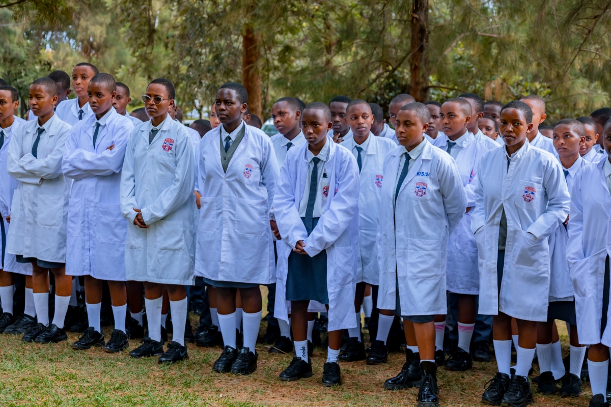 Candidates follow State Minister for Education Claudette Irere's briefings as she officially launched the exams at Kagarama Secondary School.
