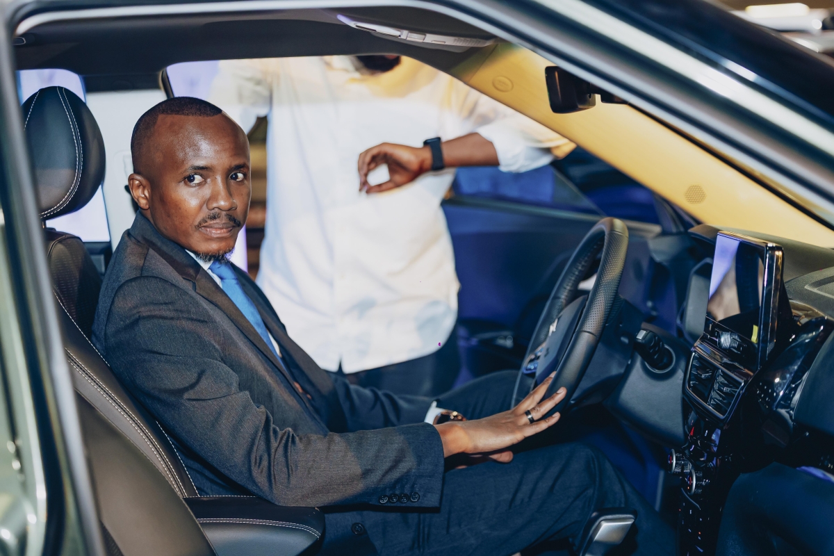 A participant tests the comfort of the Mahindra XUV 3XO during its launch event in Kigali. Photo by Dan Gatsinzi