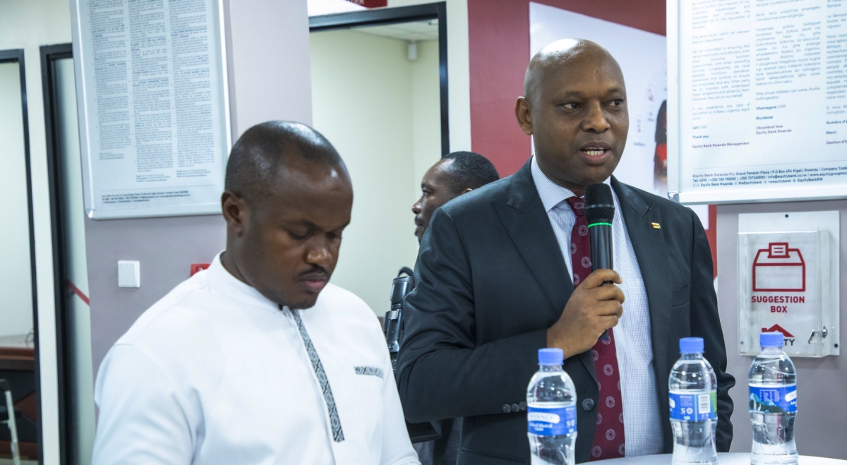Equity Bank Rwanda's Managing Director Harrington Namara speaks during the opening of Nyamirambo branch in Kigali on Thursday, June 4. All photos by Kellya Keza