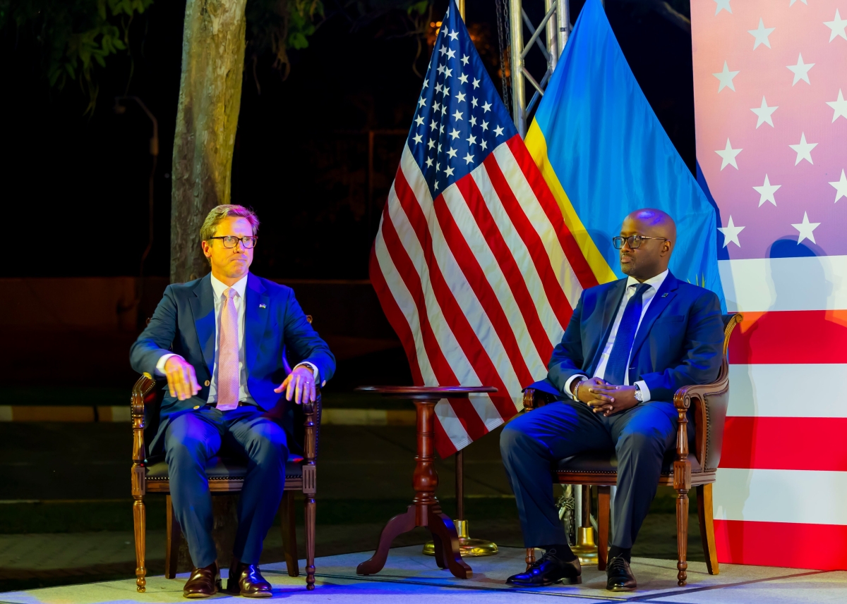 Minister of Foreign Affairs and International Cooperation Olivier Nduhungirehe and John Armiger, the Chargé d'Affaires at the US Embassy during  event in Kigali on June 4. Courtesy