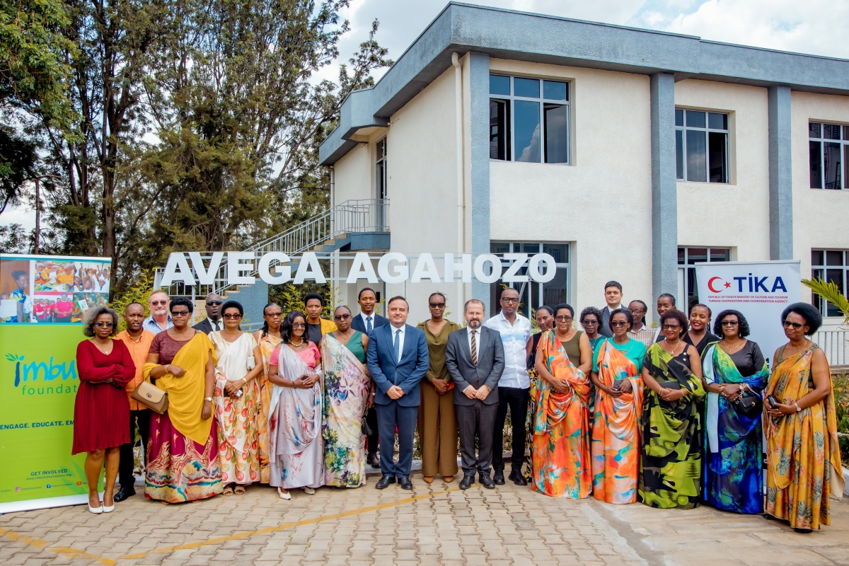 Officials from TIKA, the Imbuto Foundation, the Rwanda Biomedical Centre, and AVEGA Agahozo women pose for a group photo after receiving a mobile clinic on June 5.