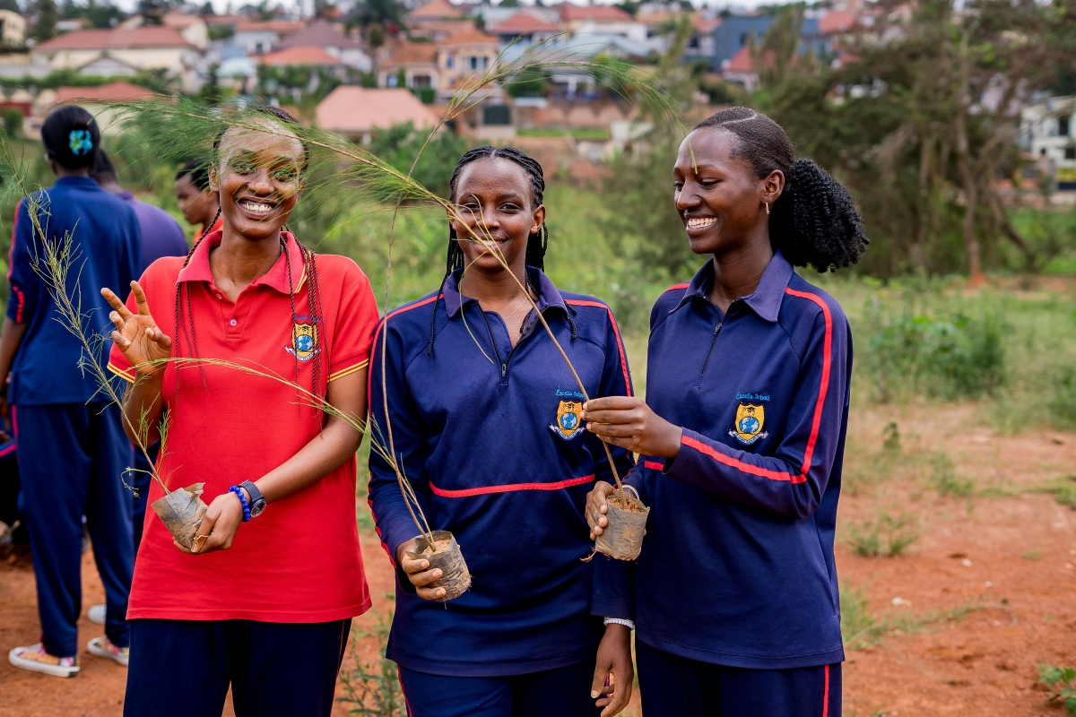 Excella High School students hold seedlings for planting on World Environment Day, in line with greening the future (courtesy)
