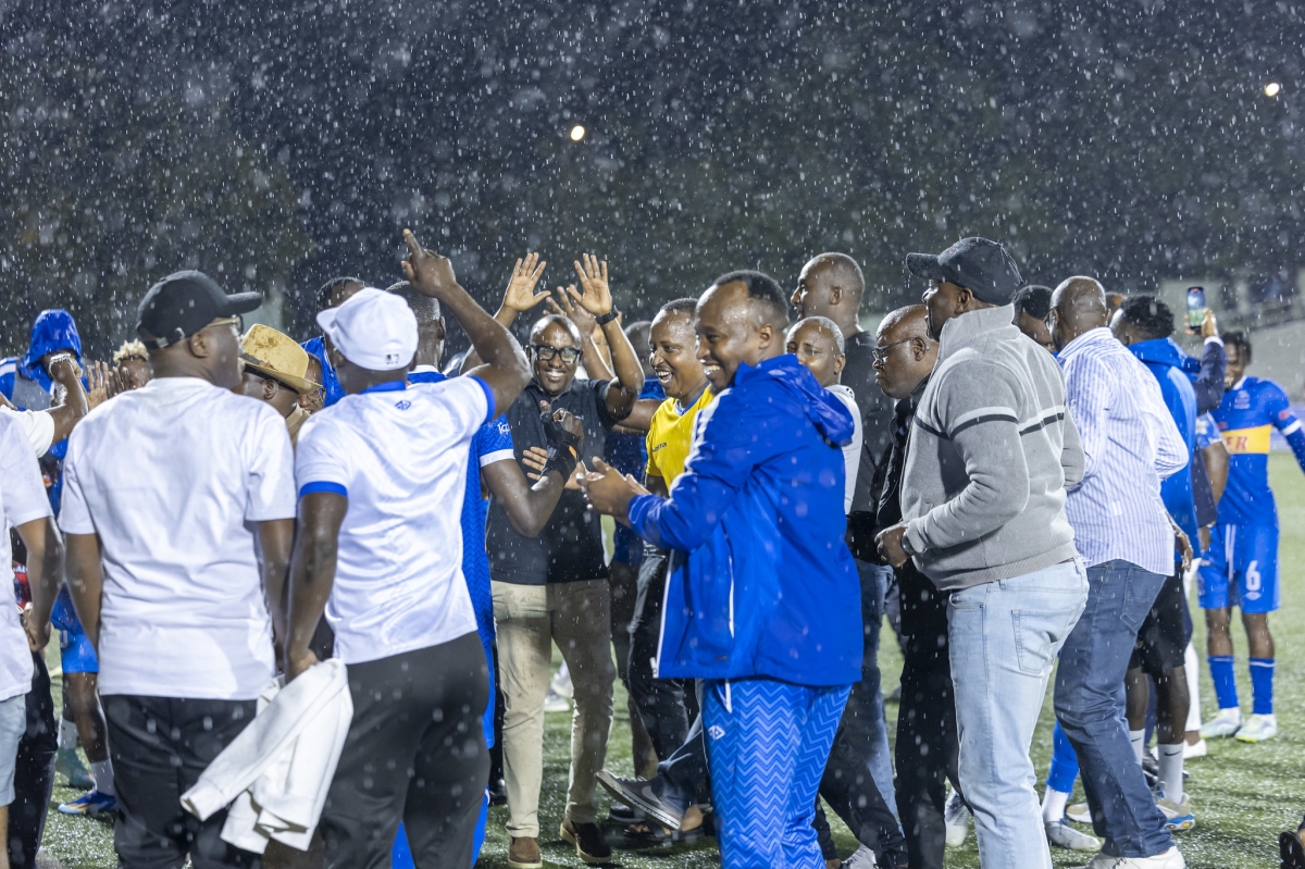Rayon Sports players, fans and officials celebrate a 1-0 victory over Police FC at Kigali Pele stadium on May 11, 2025. Photo by Olivier Mugwiza