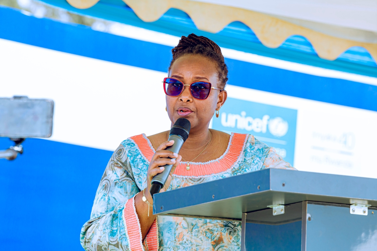 Mireille Batamuriza, the Permanent Secretary in the Ministry of Gender and Family Promotion speaks during the African Child Day celebrations  in Kageyo, Mwiri, Kayonza district on June 16.