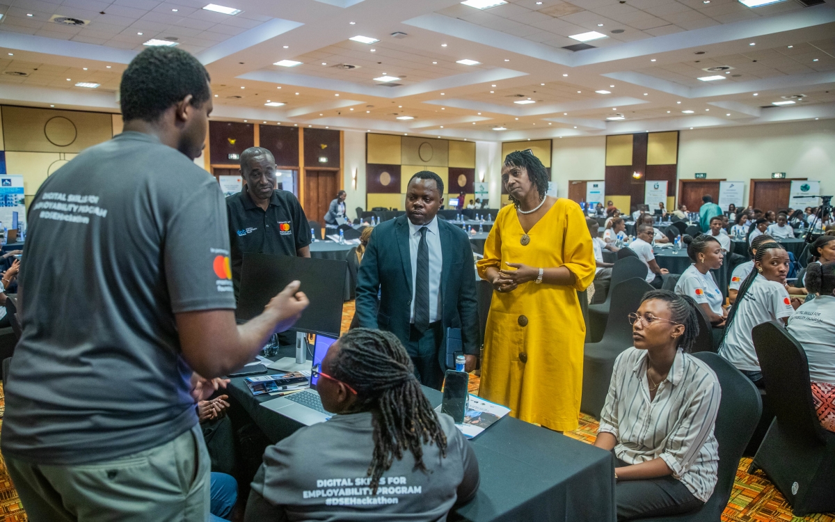 An exhibitor speaks about his start-up during the event.