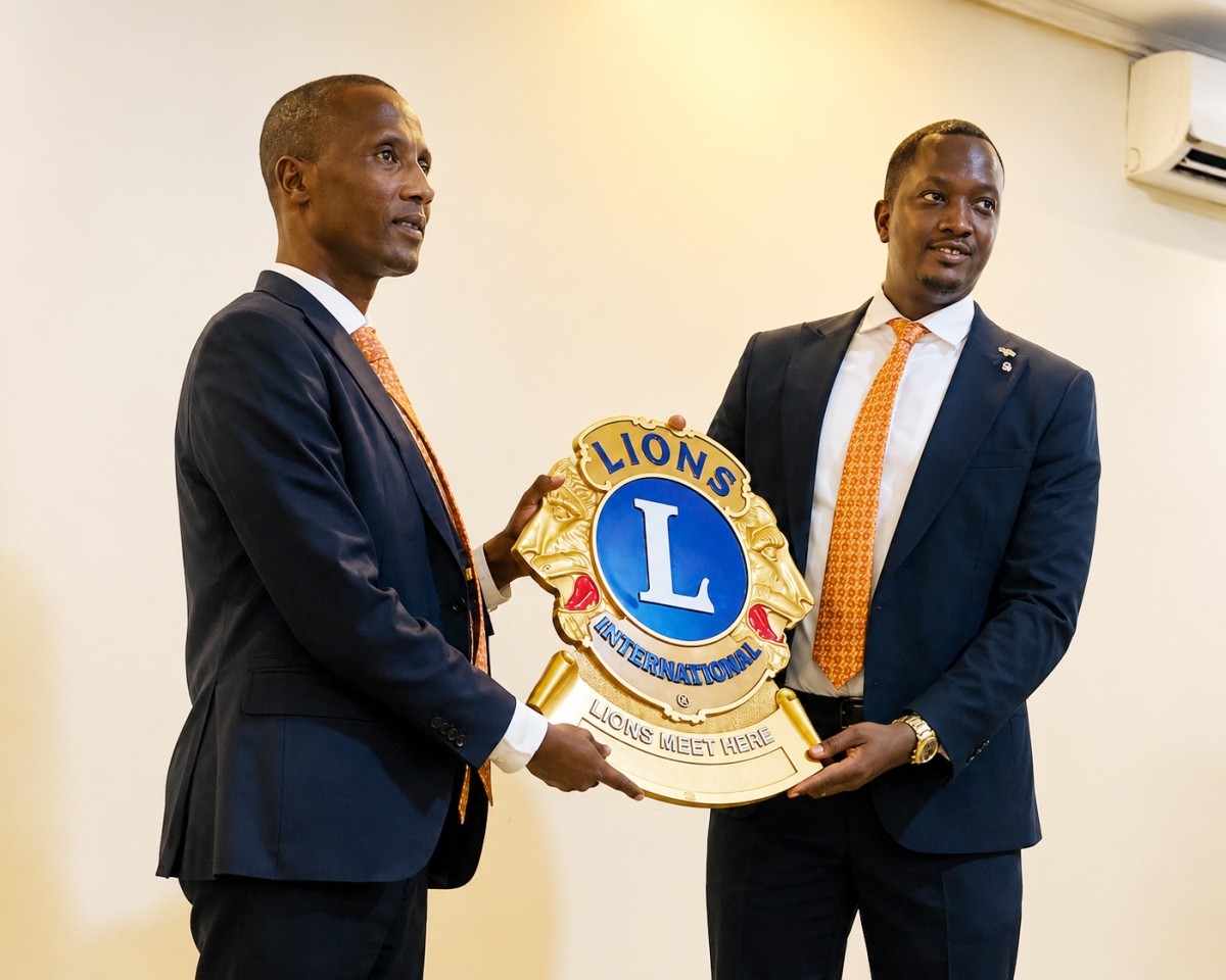 Outgoing Kigali Impact President Jean Paul Nzakamwita hands over to the newly installed   Kigali Impact President Charmant Hakizimana.