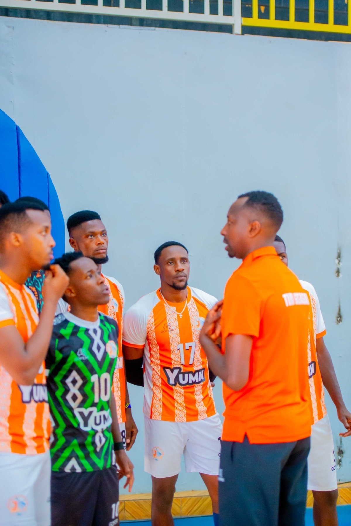 Gasagara VC head coach Marshal talks to the players.
